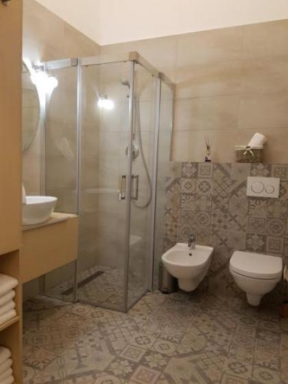Supreme City Center Apartment - image 19